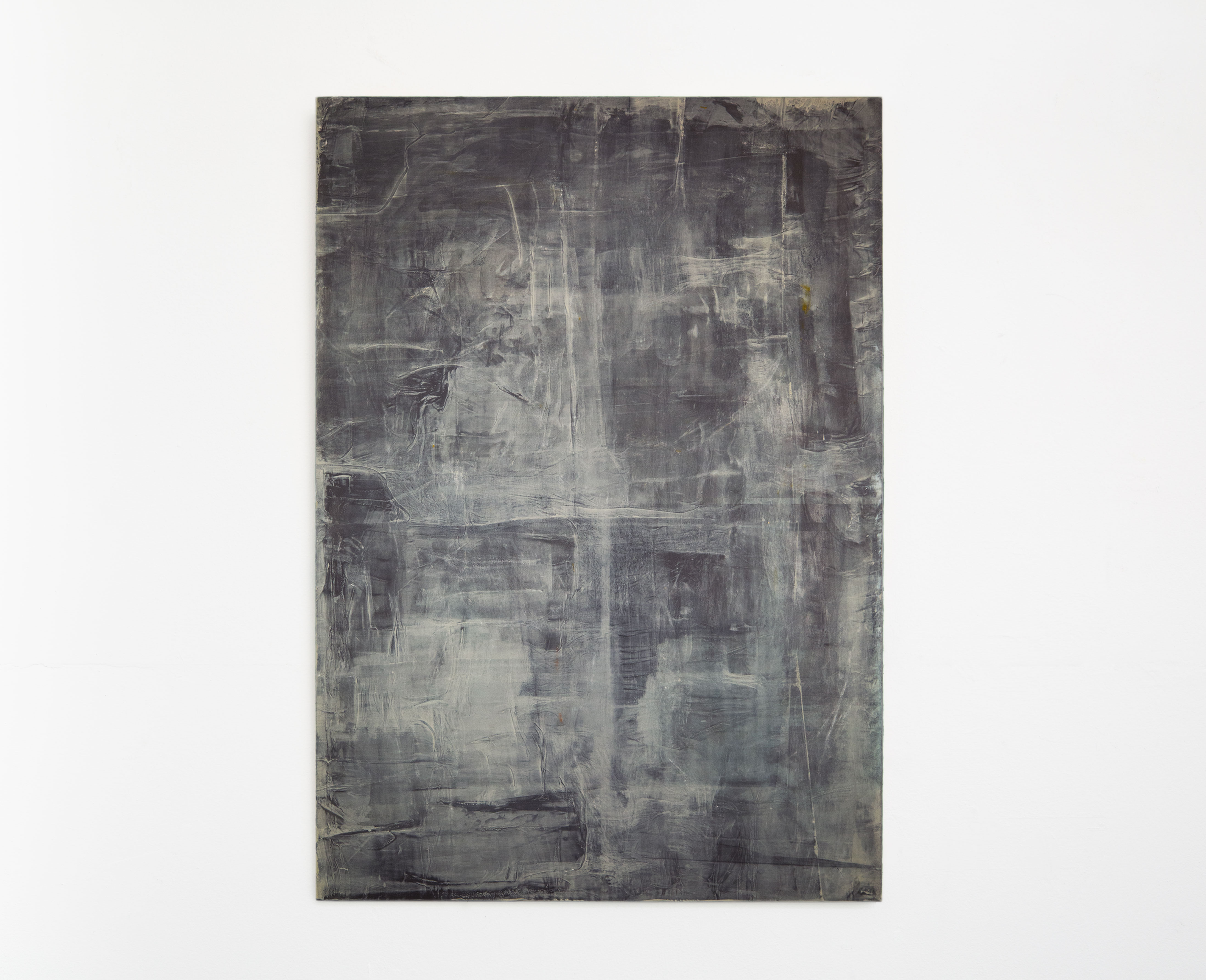 A vertical grey painting with lighter, chalky grey in the foreground and subtle strokes that create lines dividing the painting into four equal quadrants.