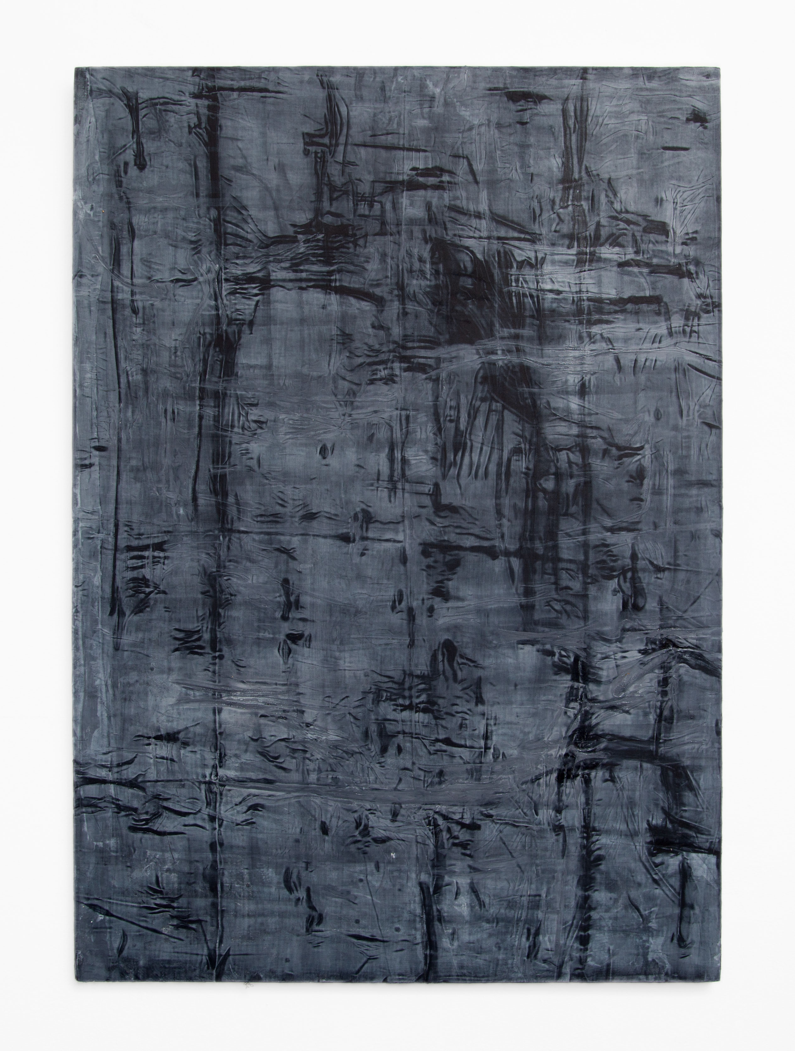 Photograph of a vertical, dark-blue and black sublime abstract painting by artist Caroline Coolidge, hung on a white wall.